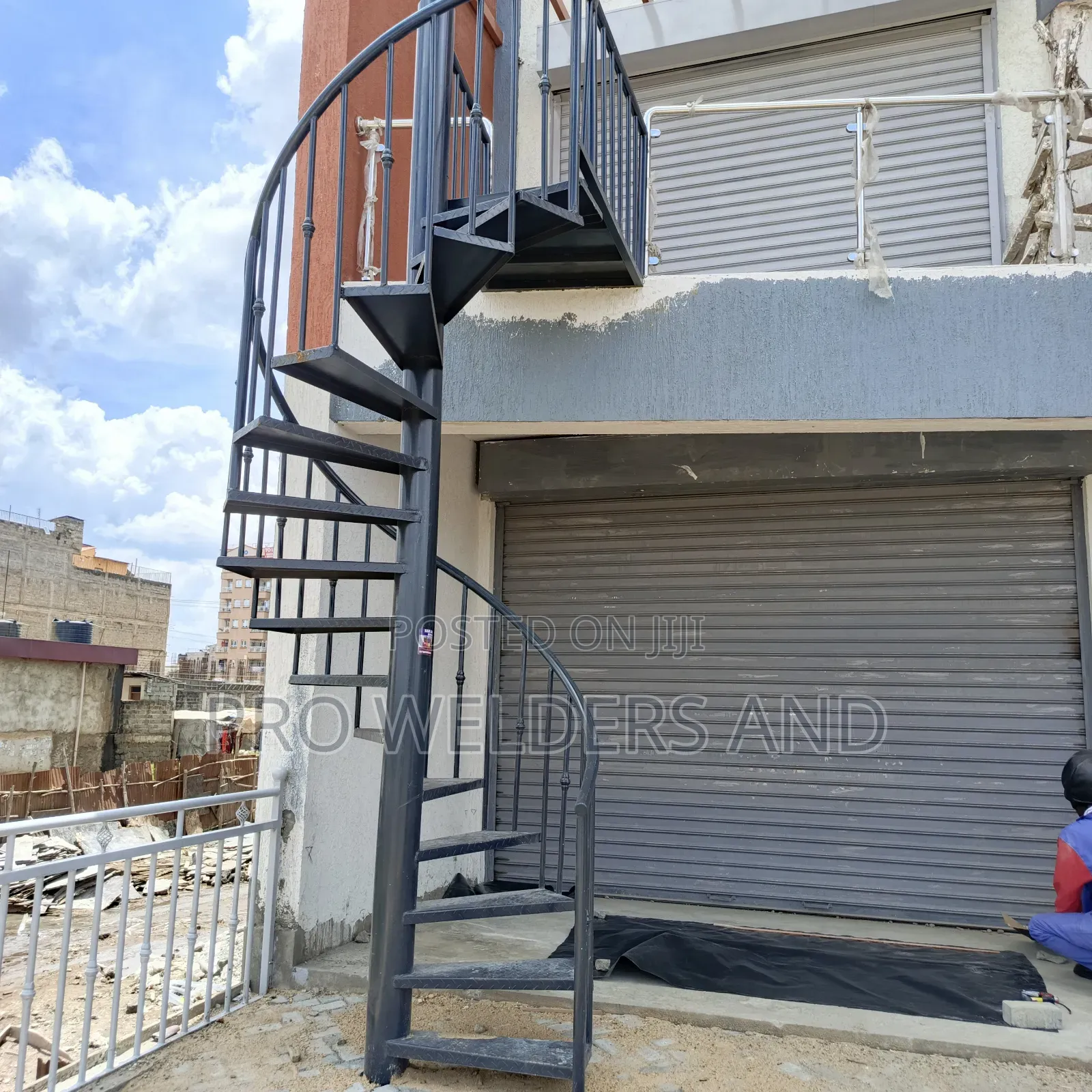 "Climb With Confidence – Modern Steel Spiral Stairs"