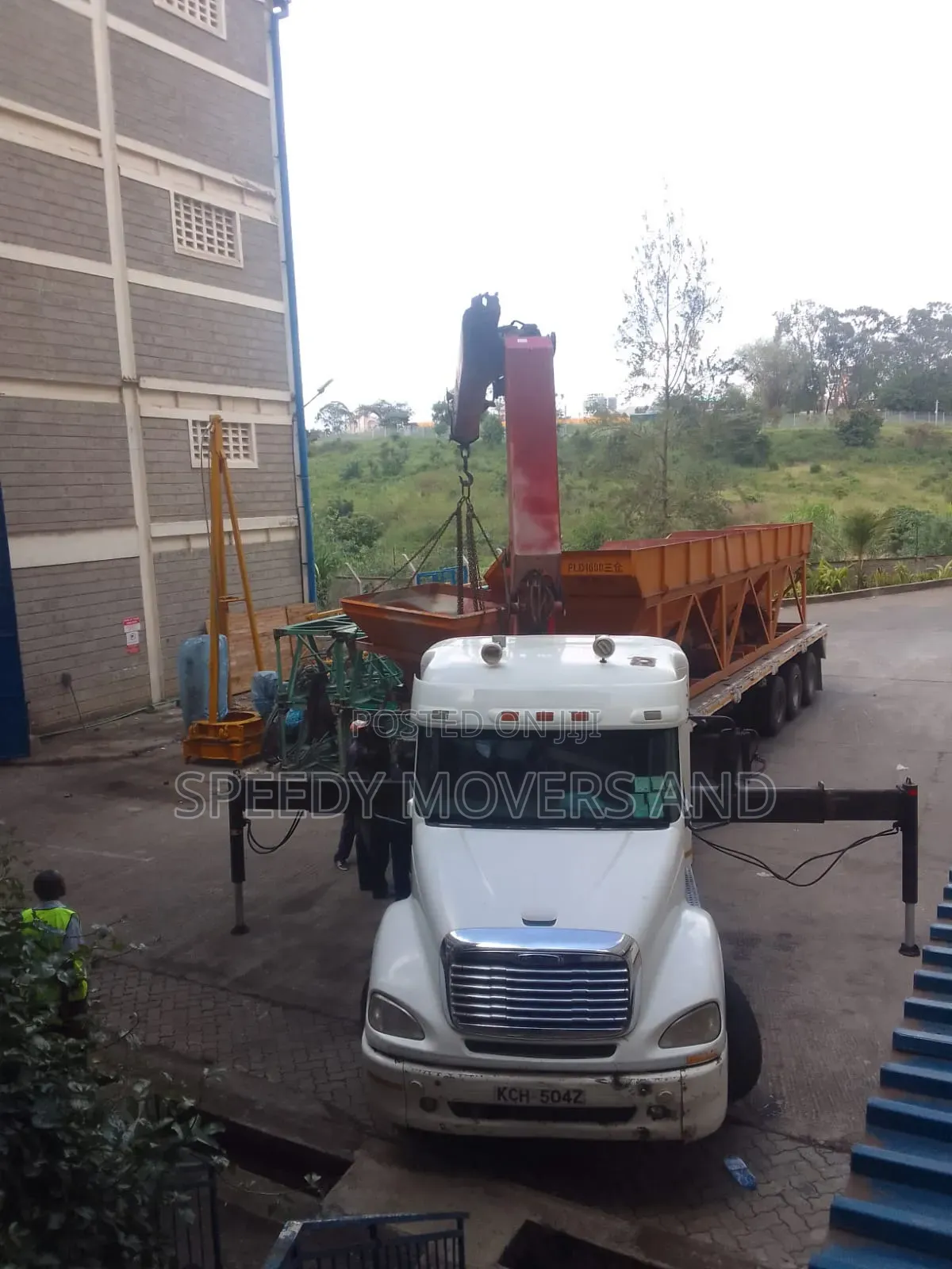Trailer With Lifting Arm at Hand for Services