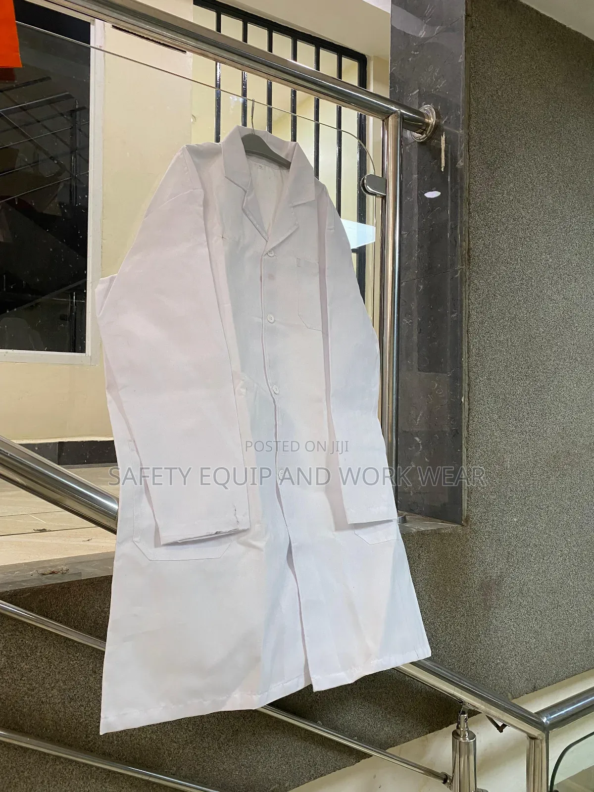 White Protective Coats For Food Industry Workers.