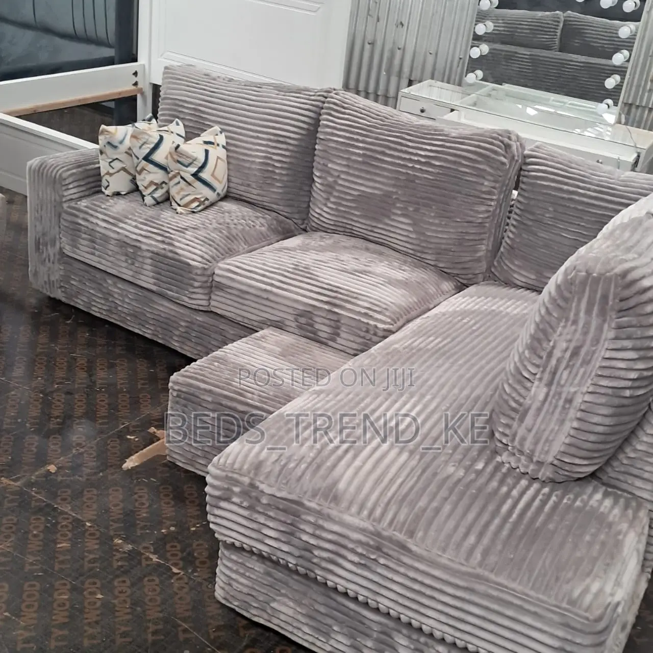 Grey 6 Seater L Seat Sofa With a Puff and Throw Pillows