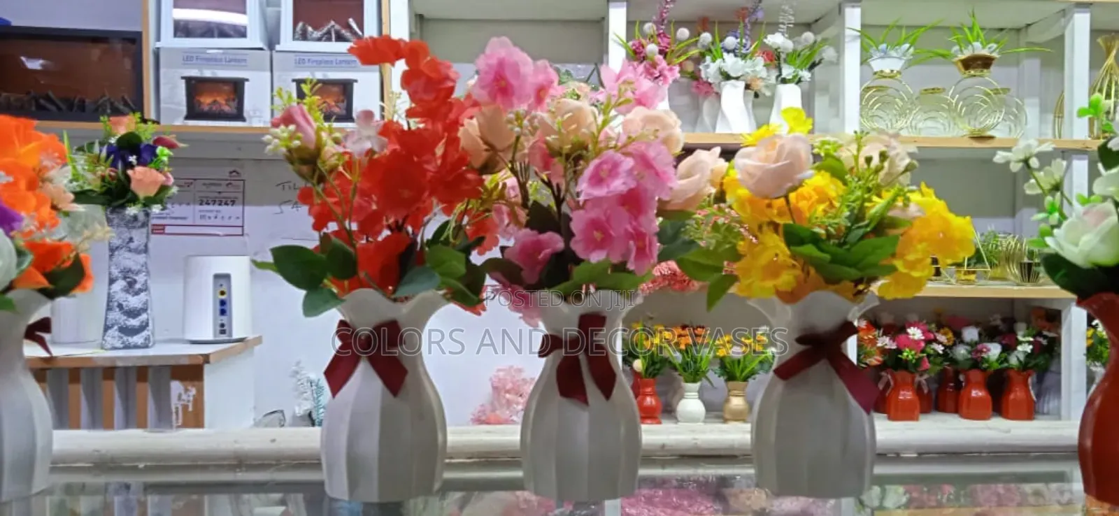 White Ribbon Vases And Flowers