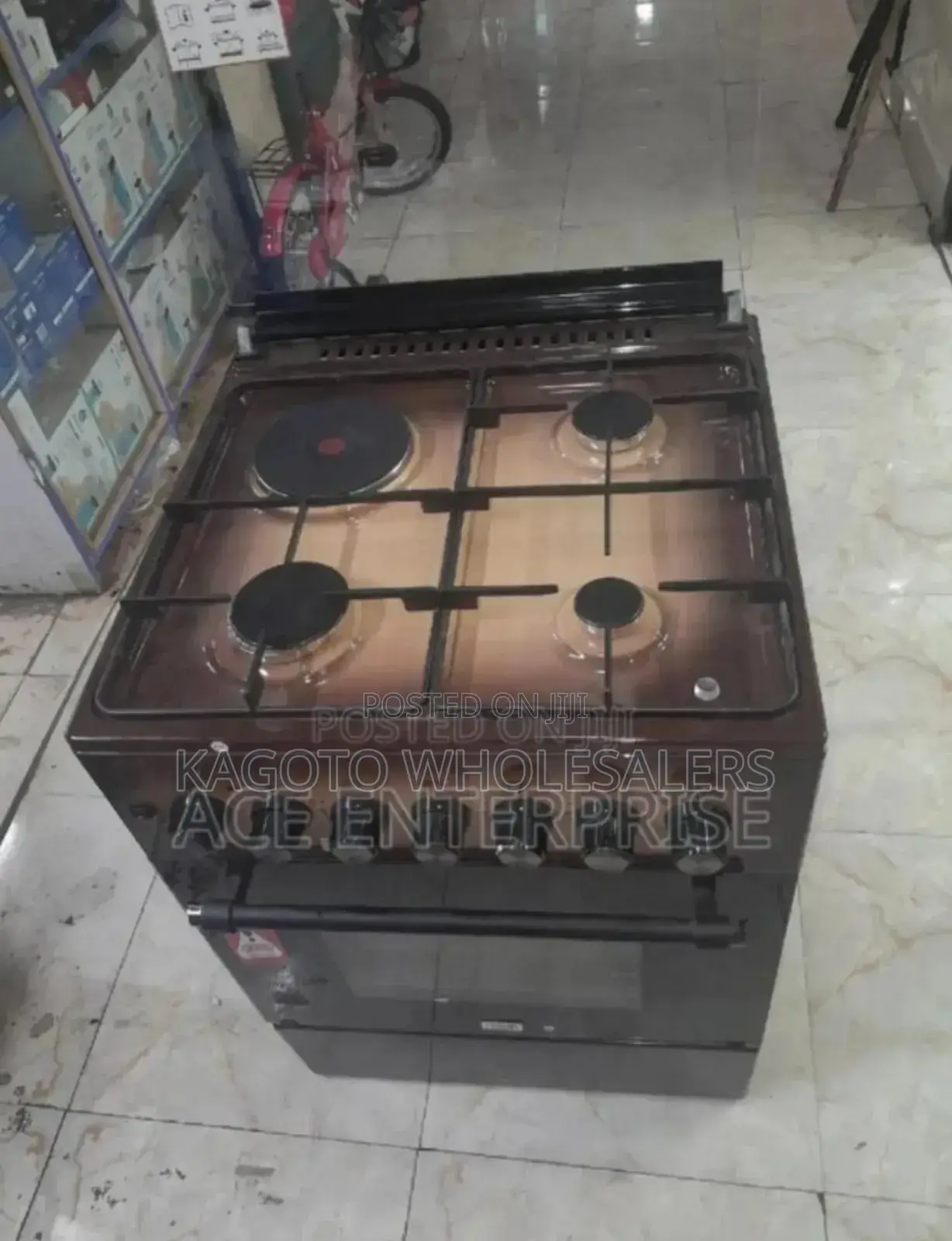 Brown Mika 60by60 Cooker. Electric Oven Electric Plate
