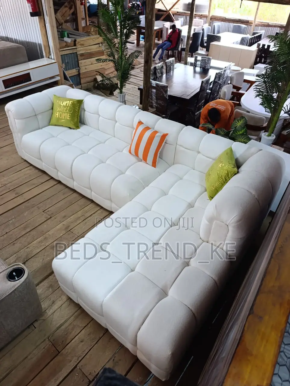 Elegant White 6 Seater L Seat With Pillows
