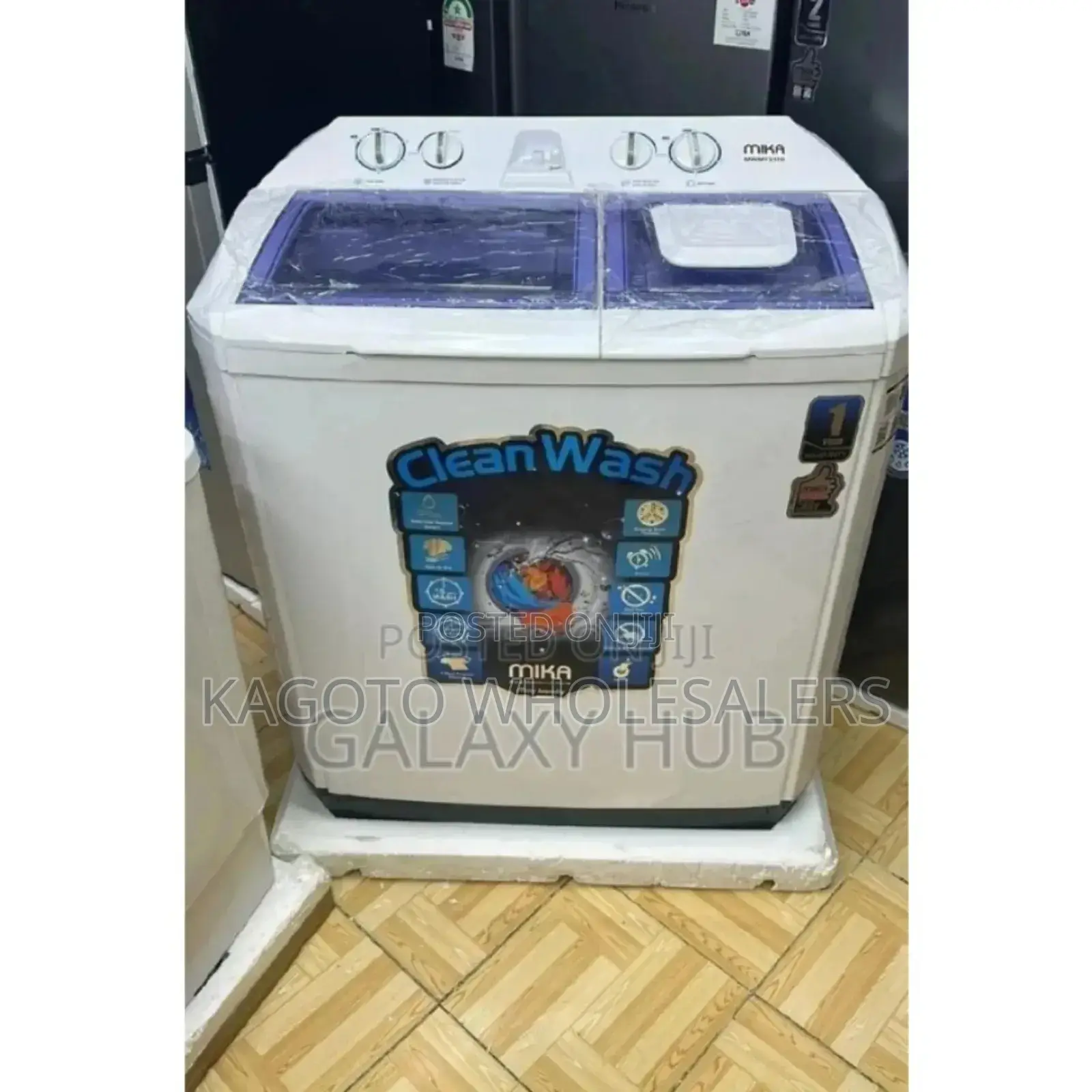 White Mika 10kgs Washing Machine. Top Load