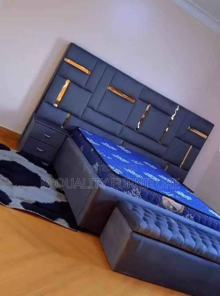 Blue Extended Head Board With Ottoman and Drawers