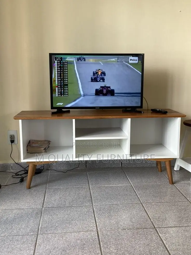 Brown Tabletop Tv Stand With in Built Storage Closets