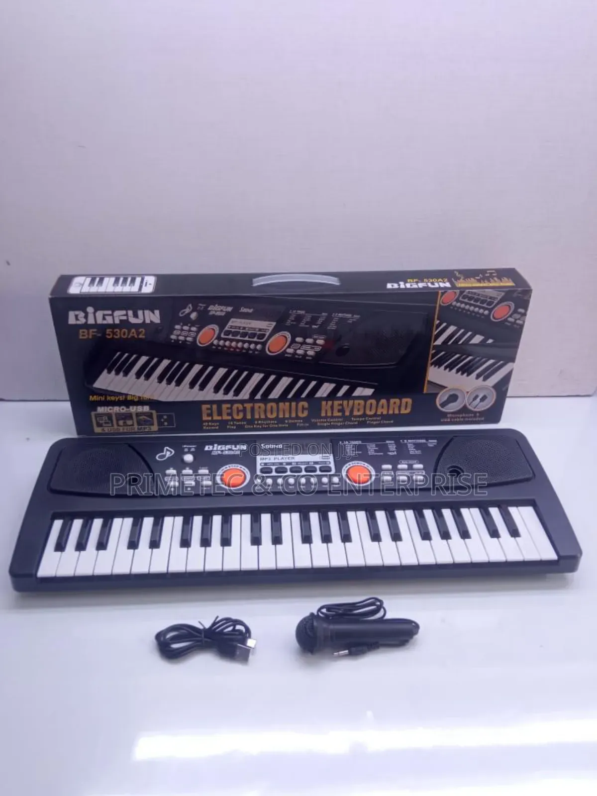 49 Keys Piano With Microphone and Charging Cable.
