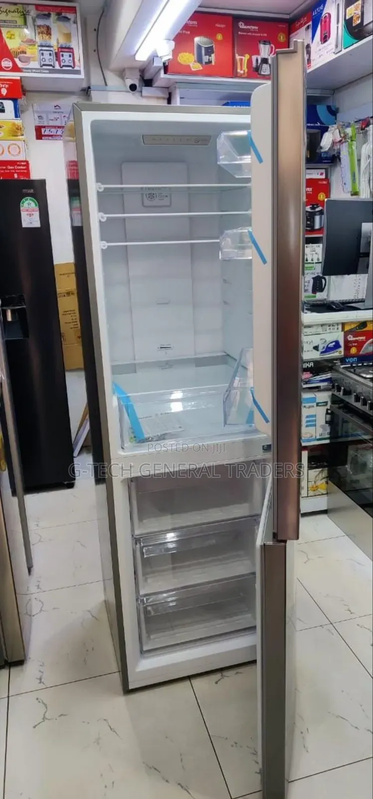 Roch 330l Double Door Bottom Freezer Silver Refrigerator