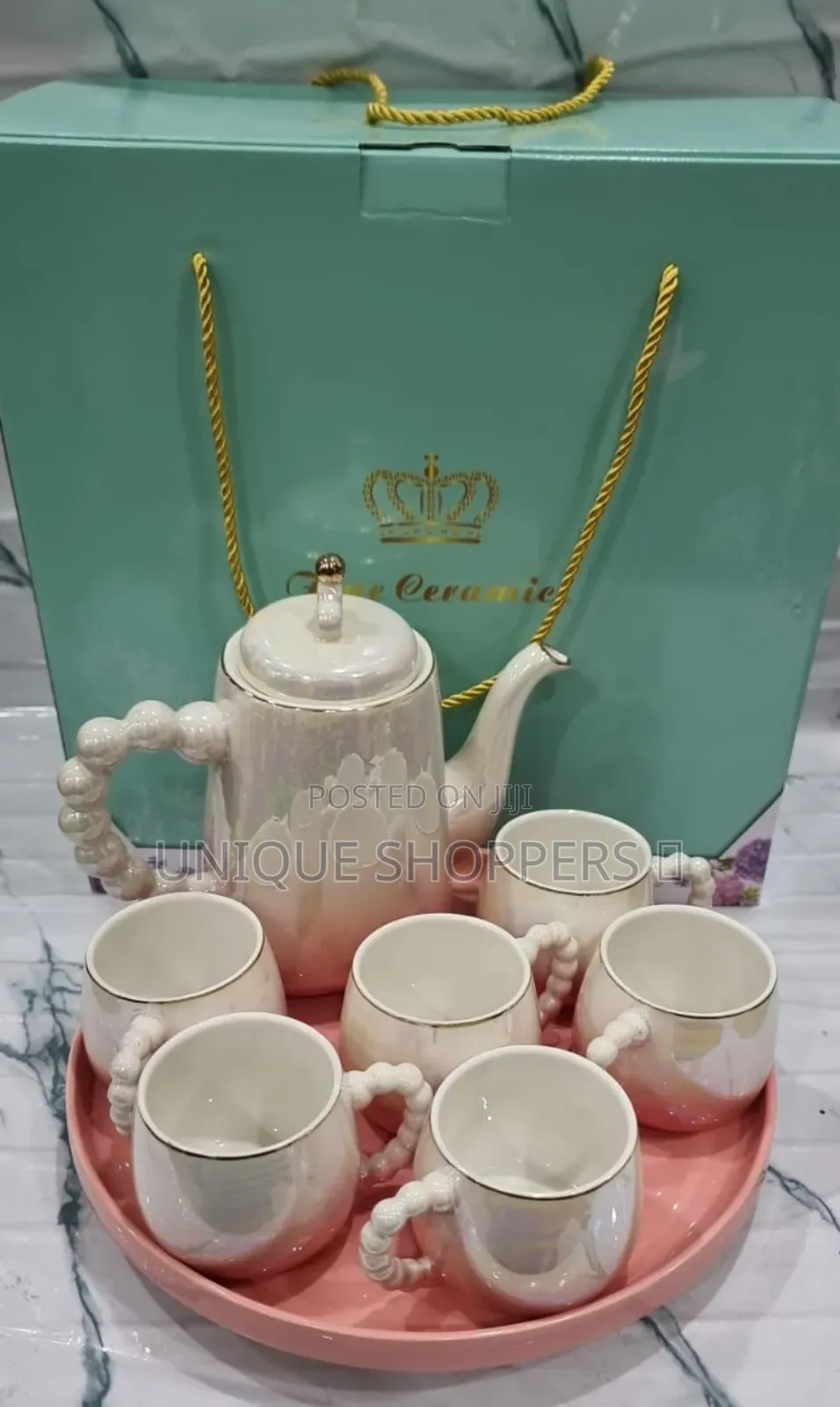 Fine Ceramic 8pc Rotating Tray Tea Set With 6 Cups and Kettle Now