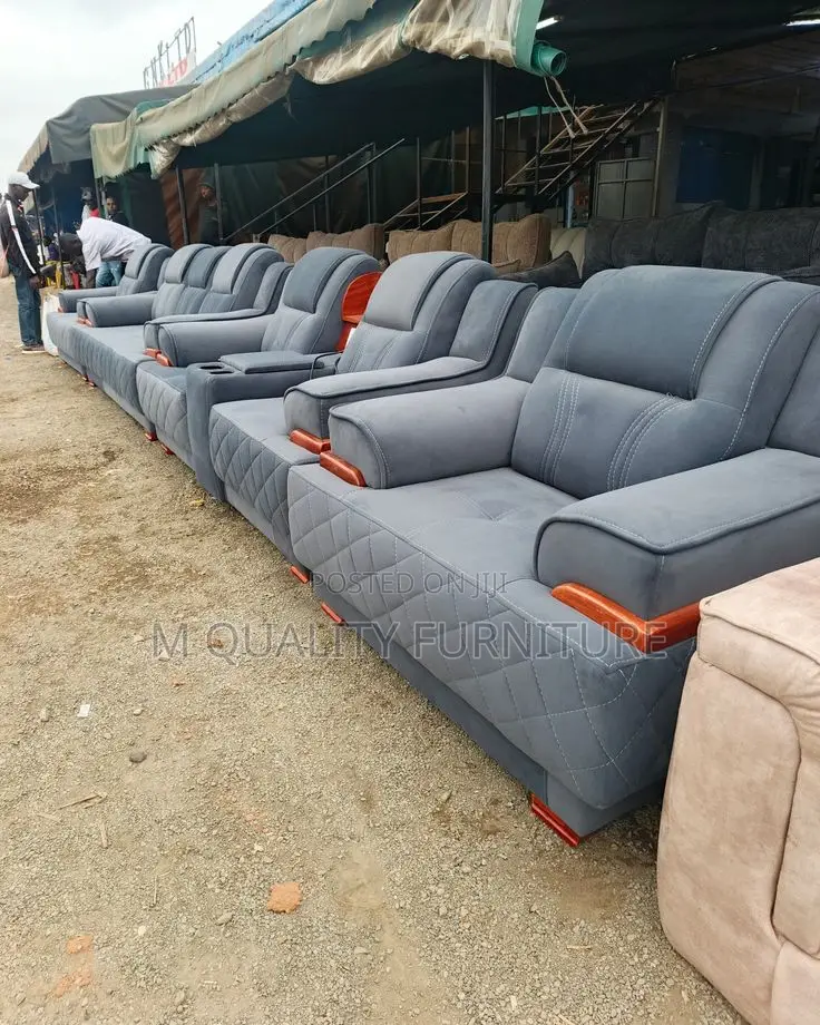 This Sofa Features Soft Fabric Upholstery
