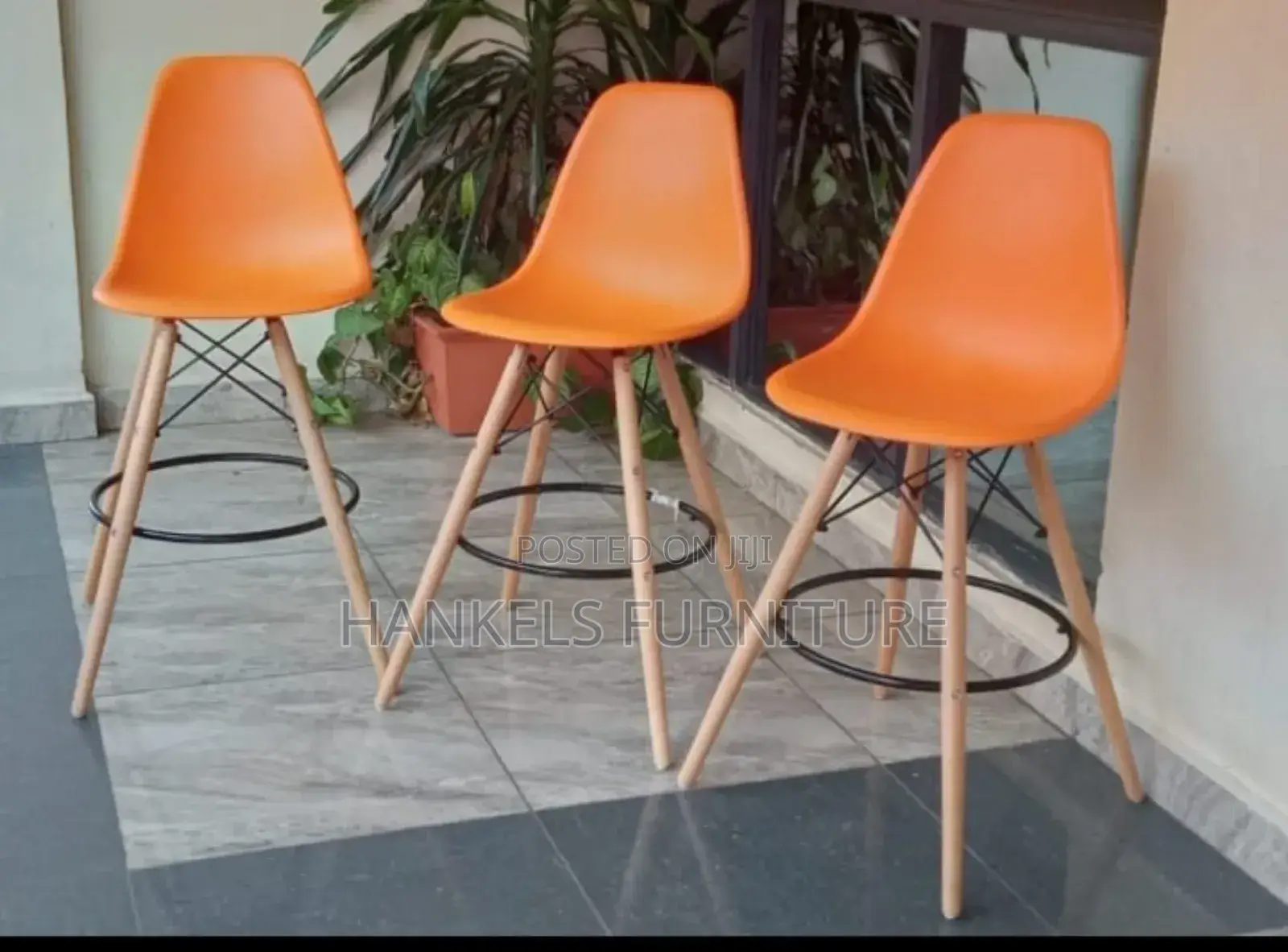 Orange Eames High Bar Stools