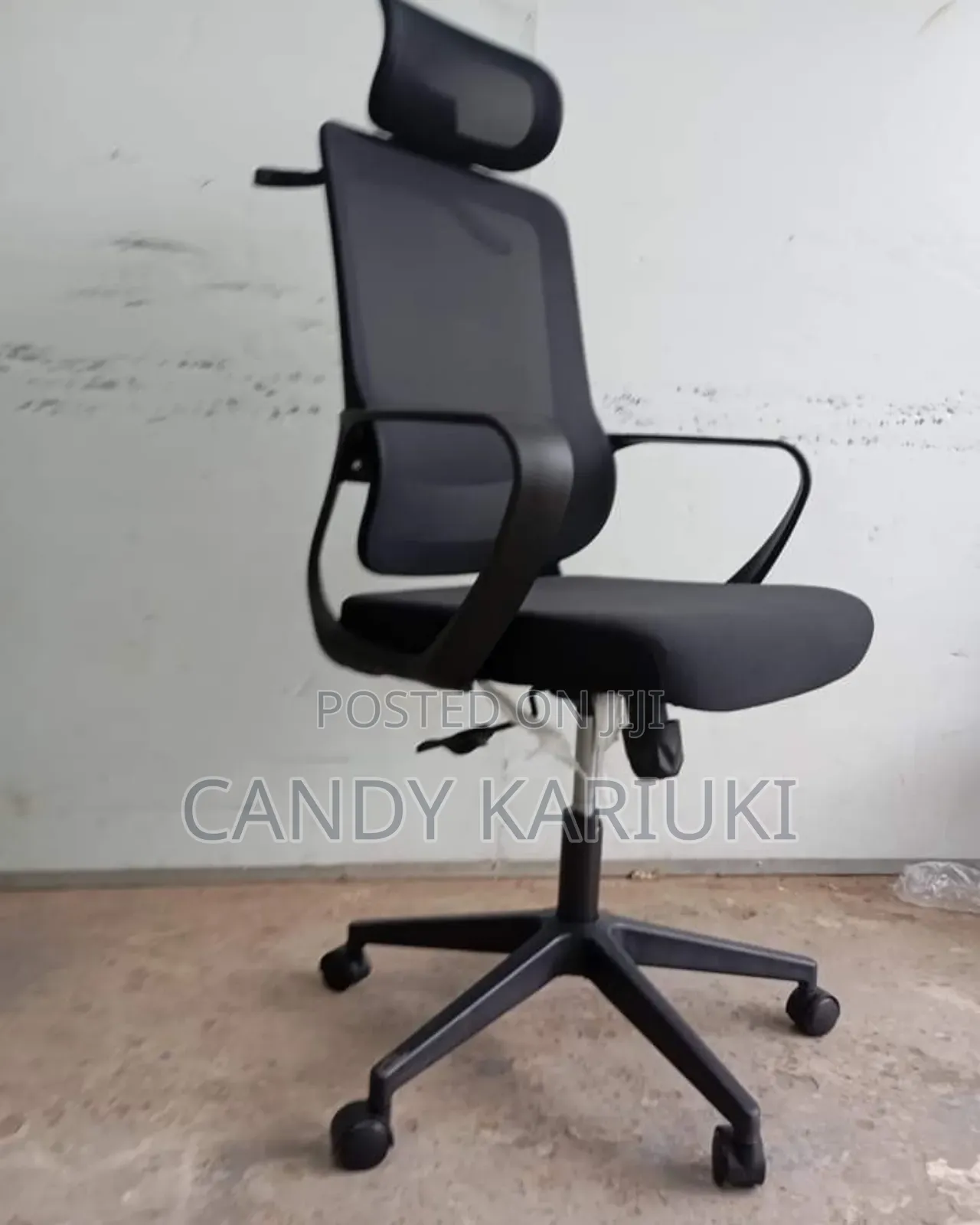Executive Office Chair With a Coat Hanger and a Mesh Back