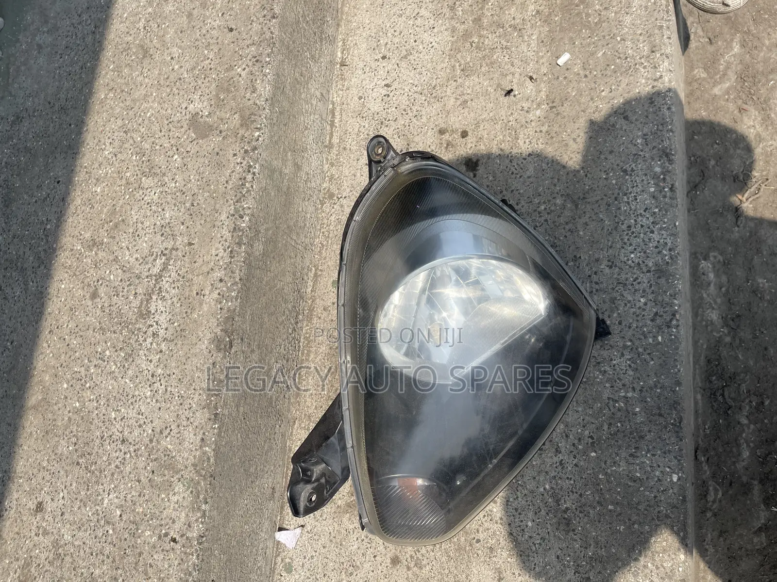 Daihatsu Mira Headlight