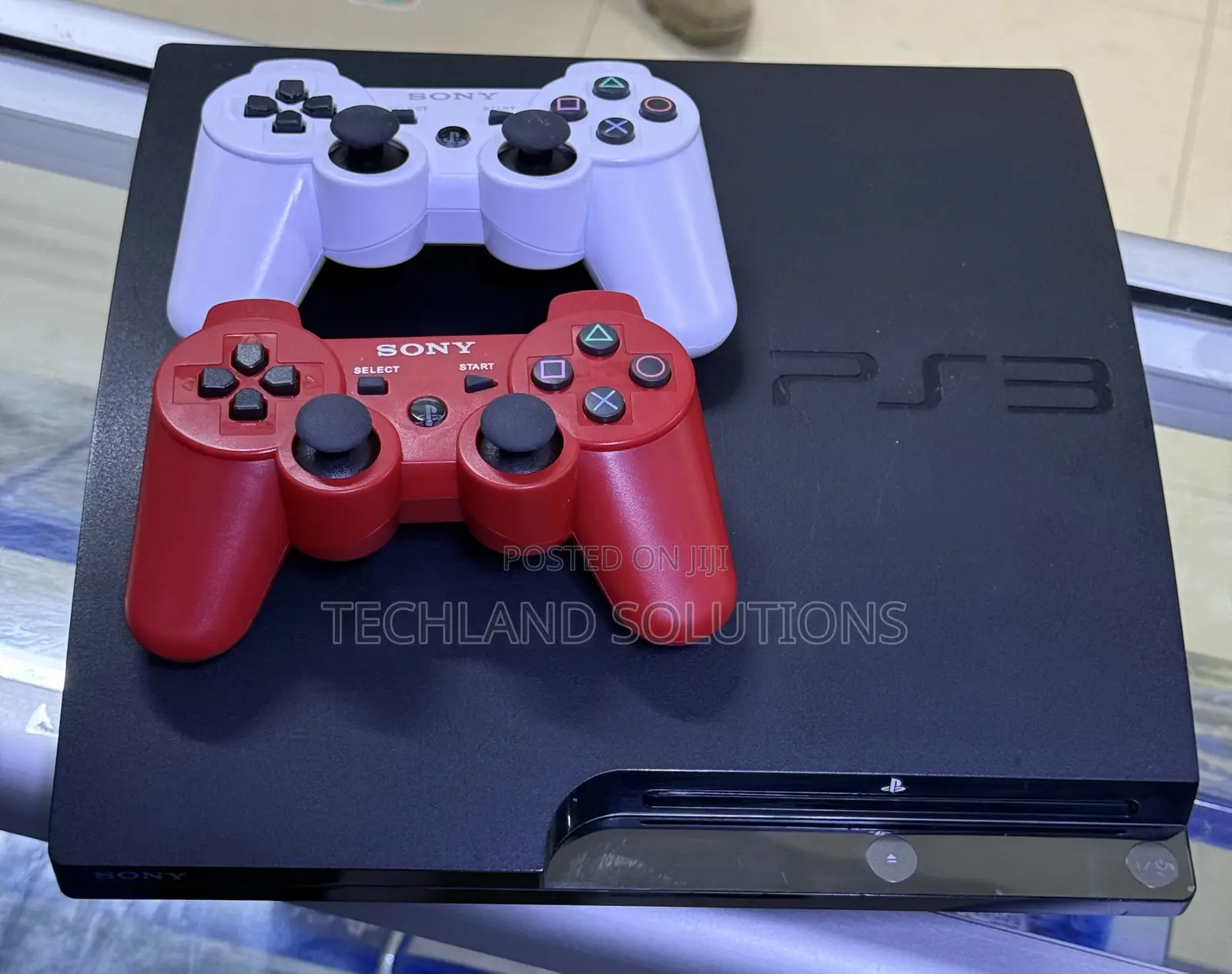 Gently Used Playstation 3 +2 Pads+ 12 Games
