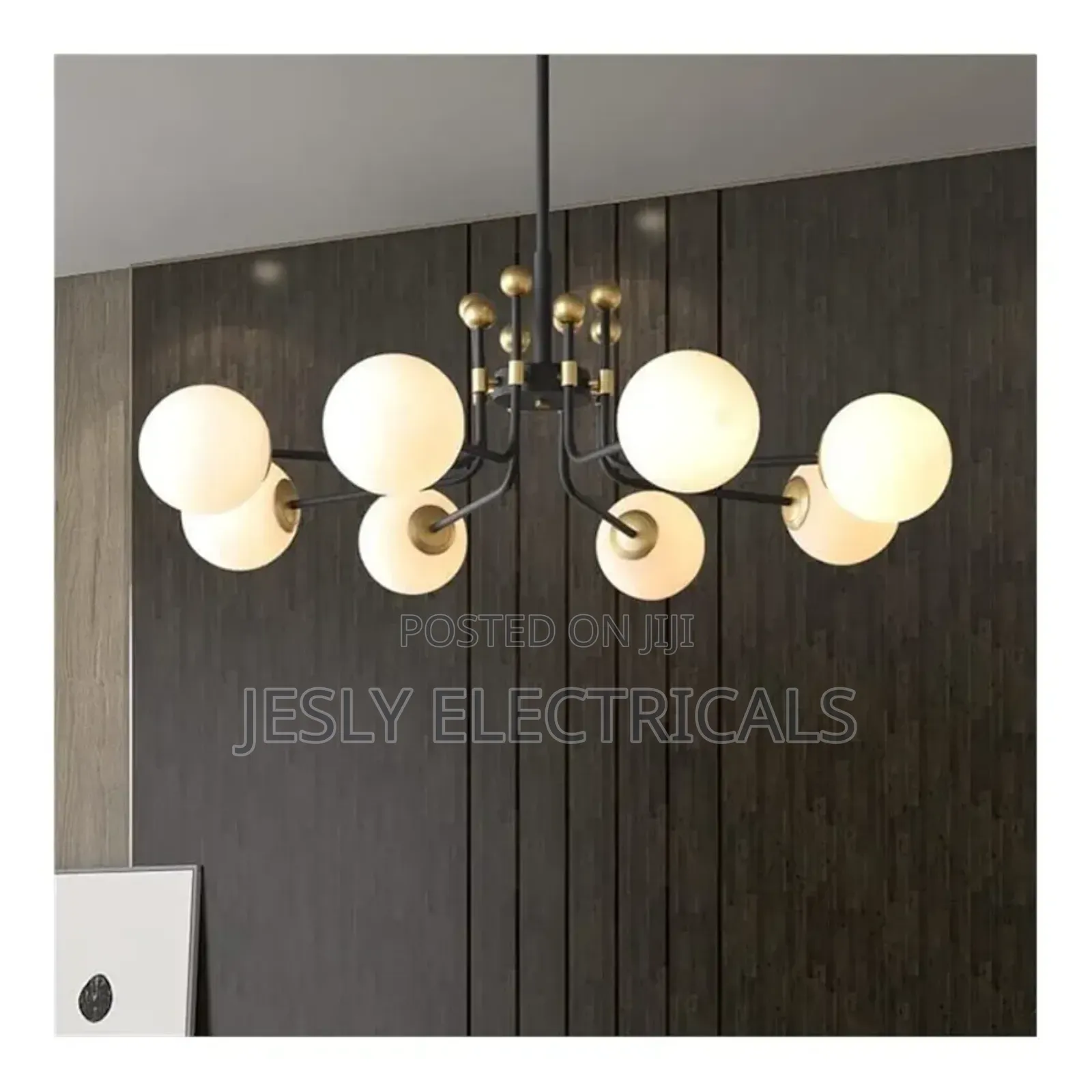 Modern Chandelier With Multiple Spherical, Opaque White Shades, Gold.
