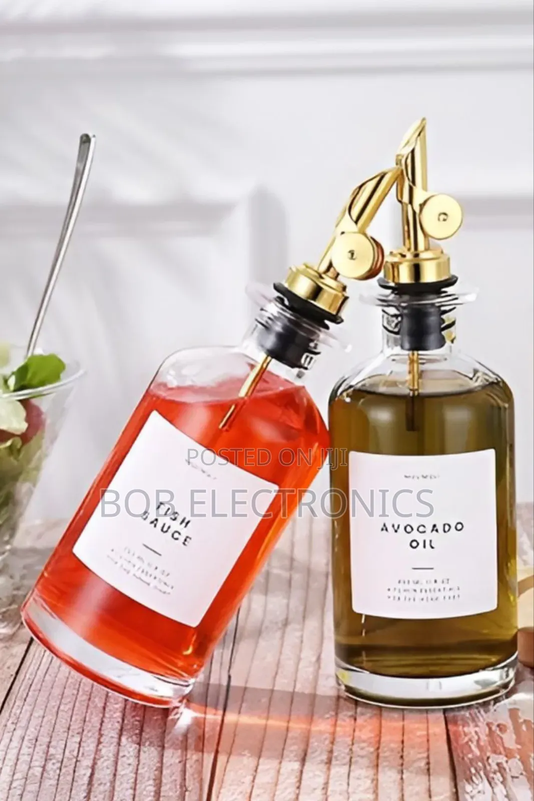 A Pair Of Oil Dispenser Bottles