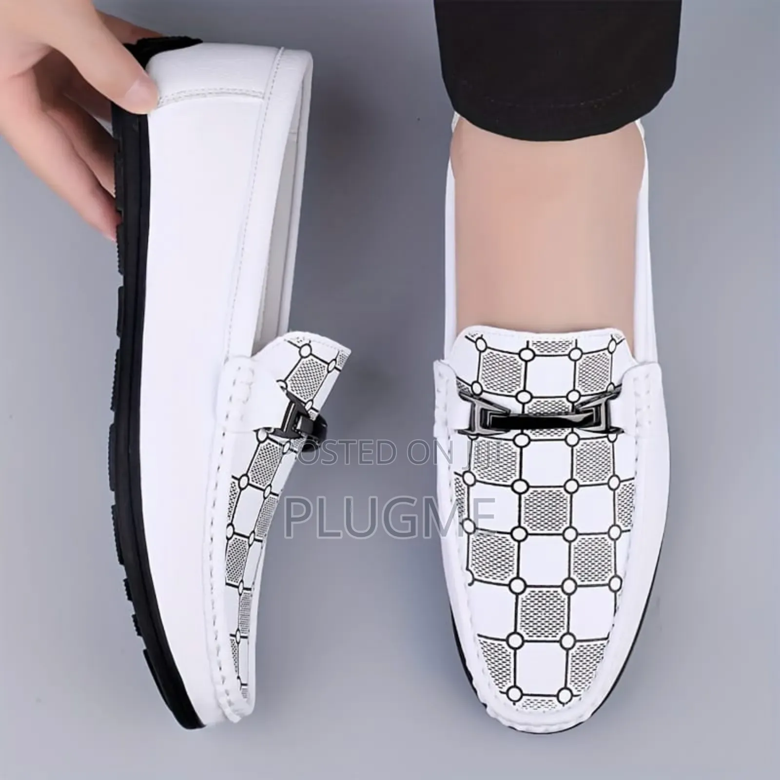 Slip-on Loafers With a Decorative Chain Detail and a Patterned Vamp.