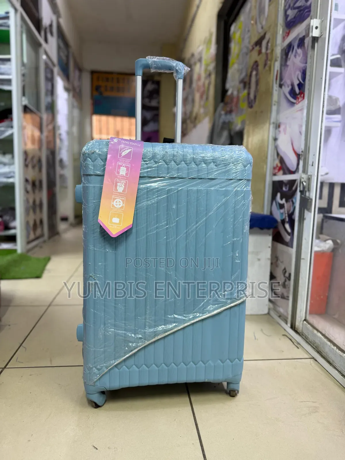 Sky Blue Rubber Suitcase in Large Size (25kgs) Height 66cm at 4000