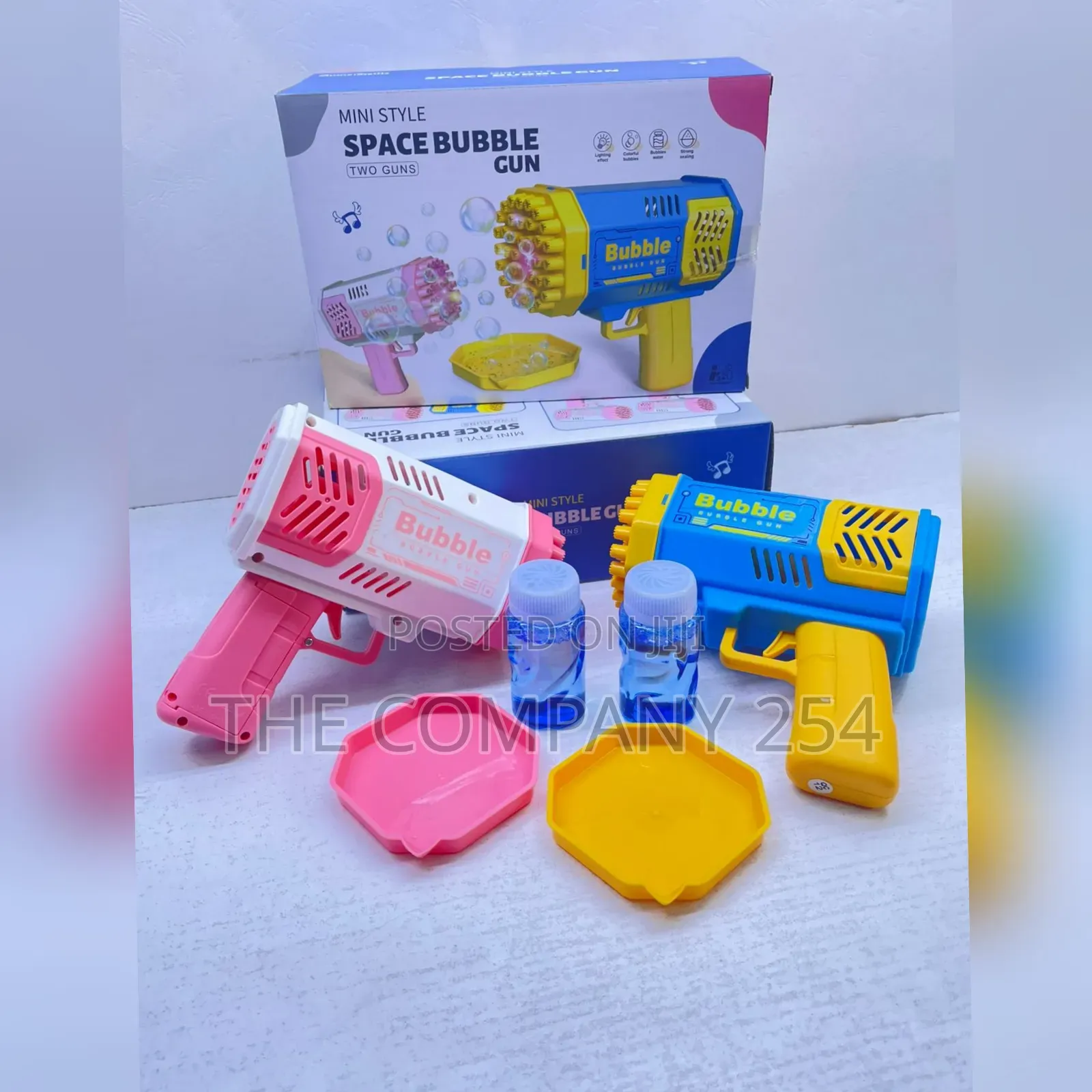2 in 1 Bubble Gun. Colours: Blue and Pink 2 Pieces in a Box