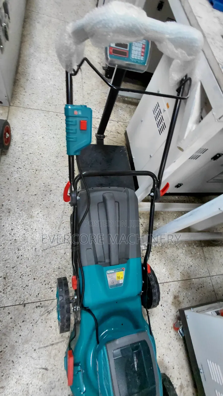 Total Brand Battery Powered Lawn Mower Machine.