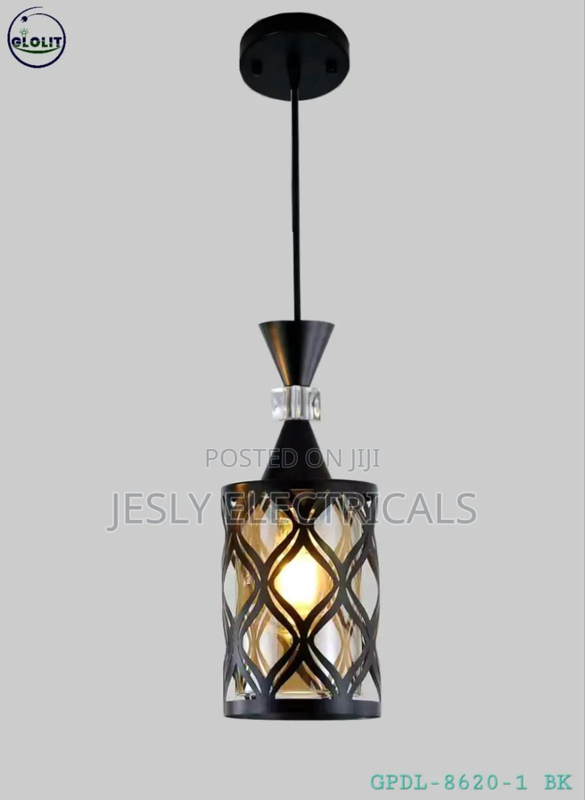 Black Metal Pendant Light With a Diamond-Pattern Cage Shade.
