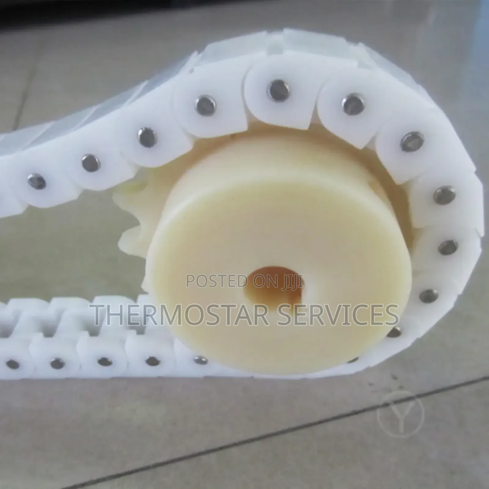 Sprocket and Plastic Conveyor