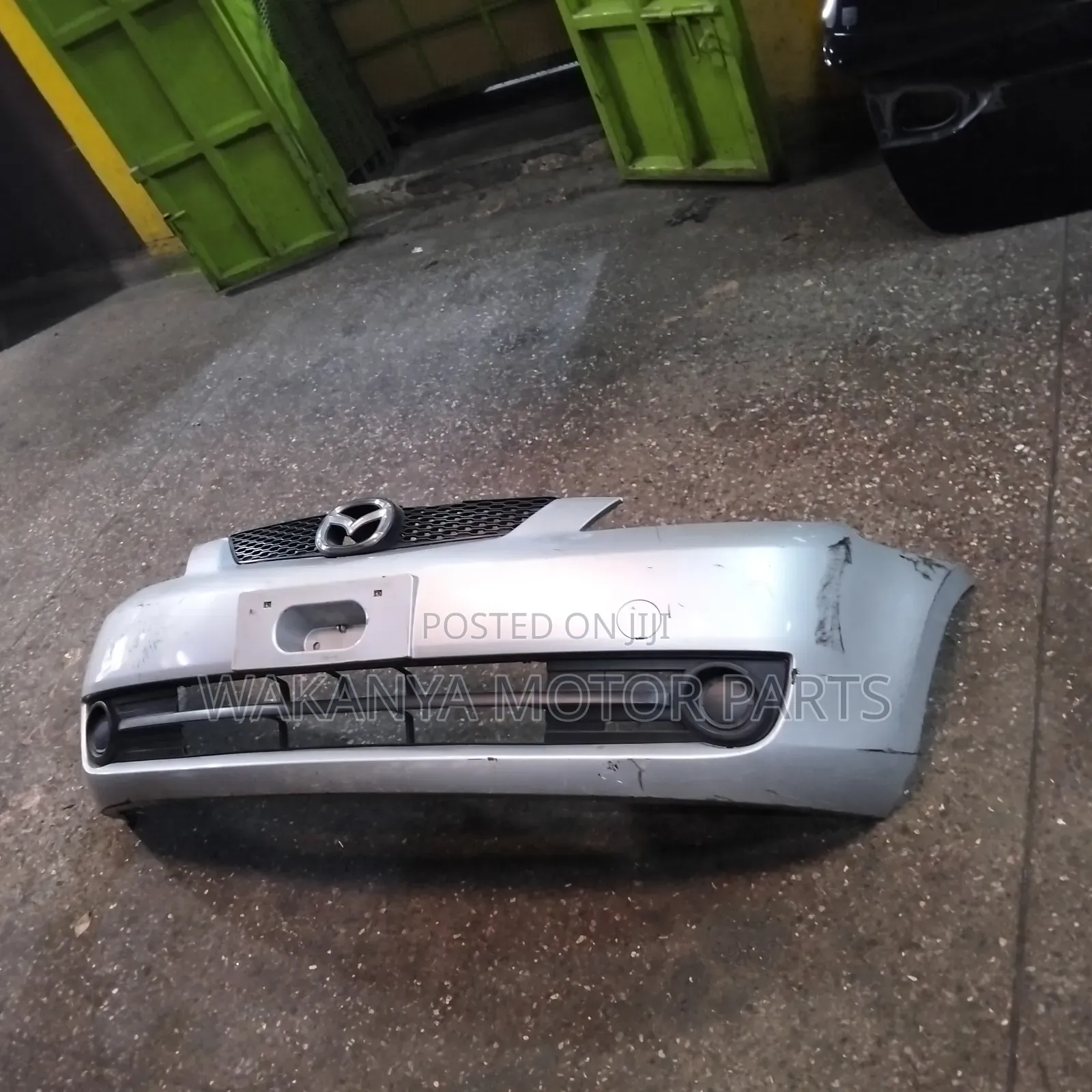Mazda Demio Model 2005/2006 Front Bumper Complete With Grille