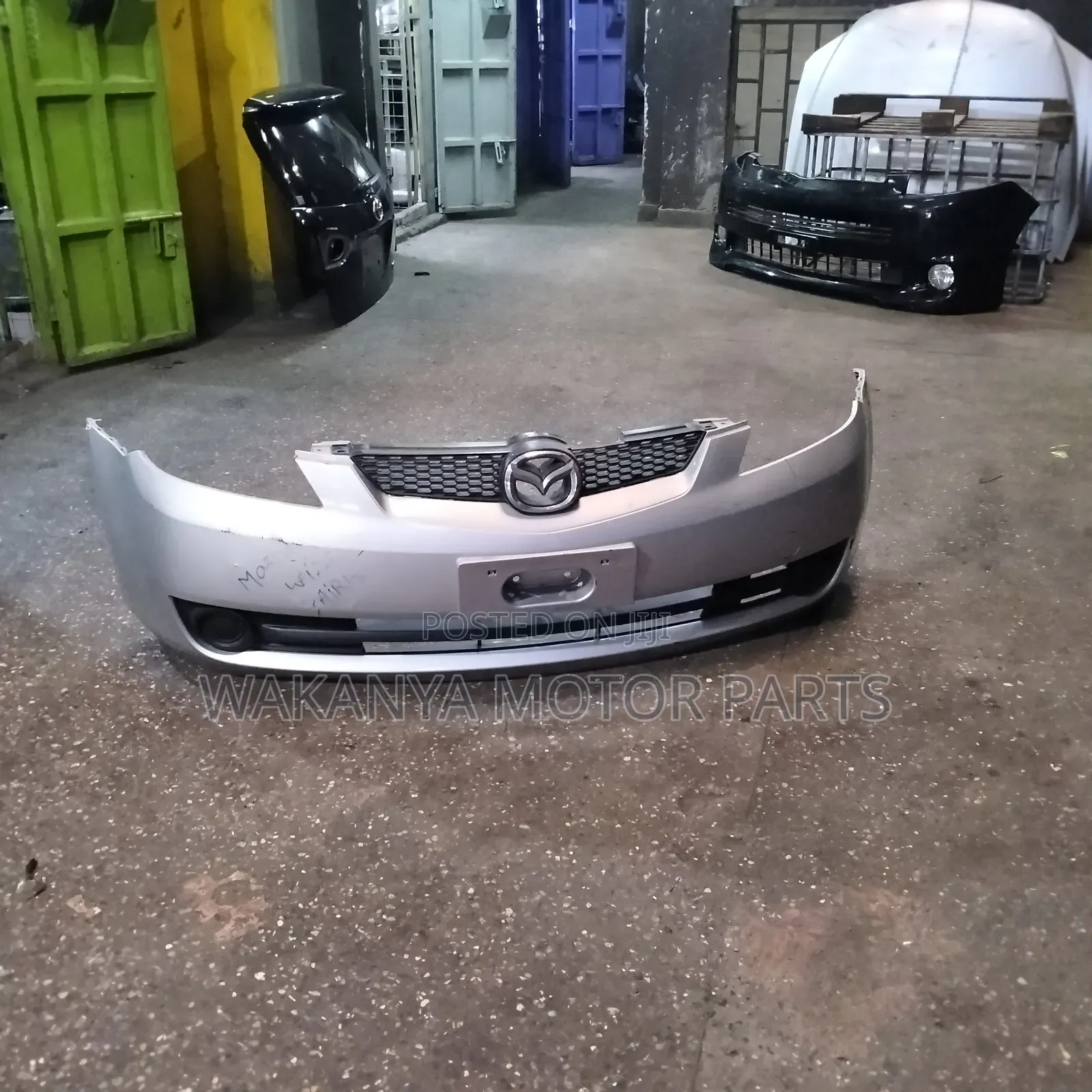 Mazda Demio Model 2005/2006 Front Bumper Complete With Grille