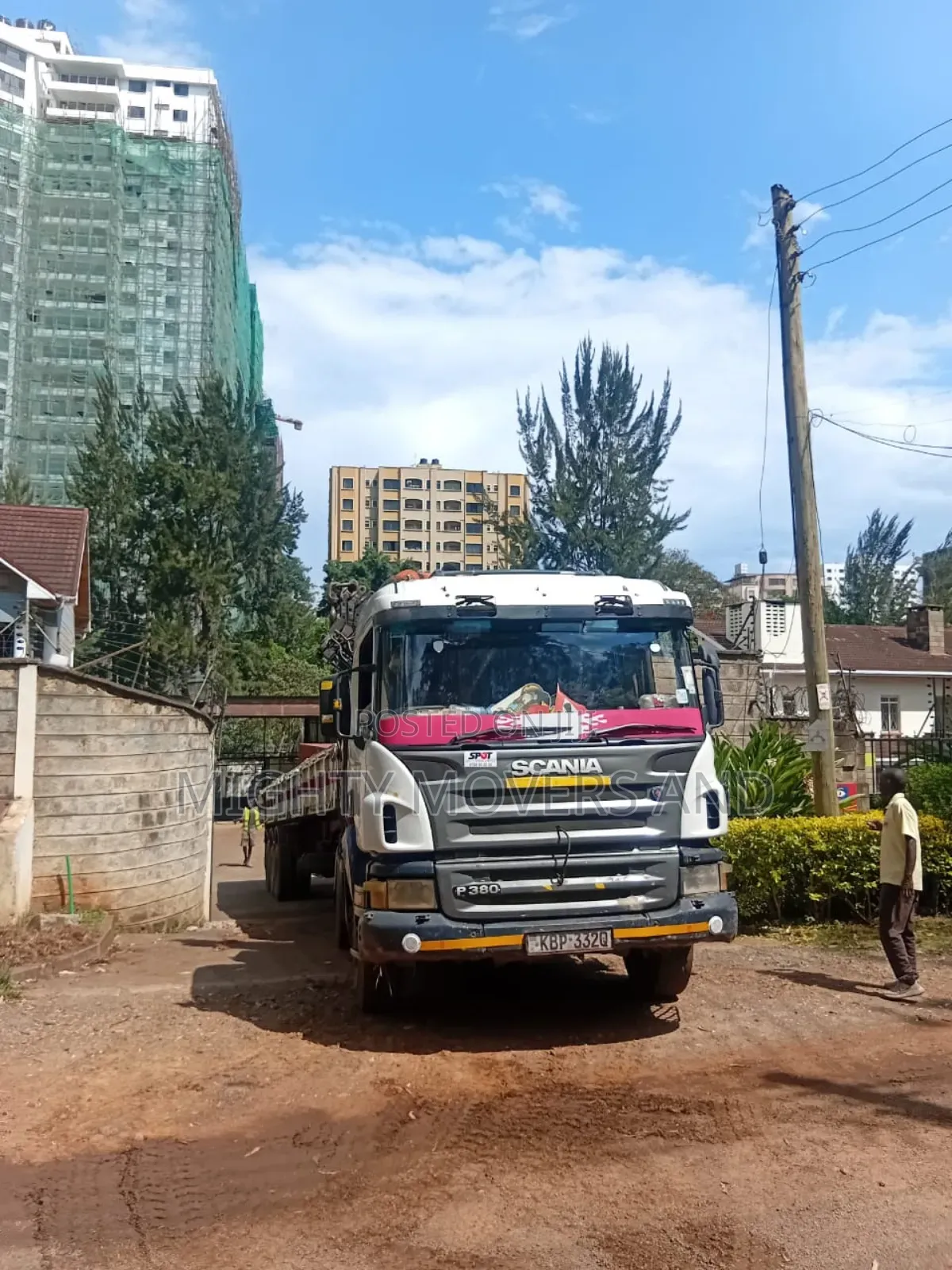 Trailer With Crane Ready for Delivery of Goods