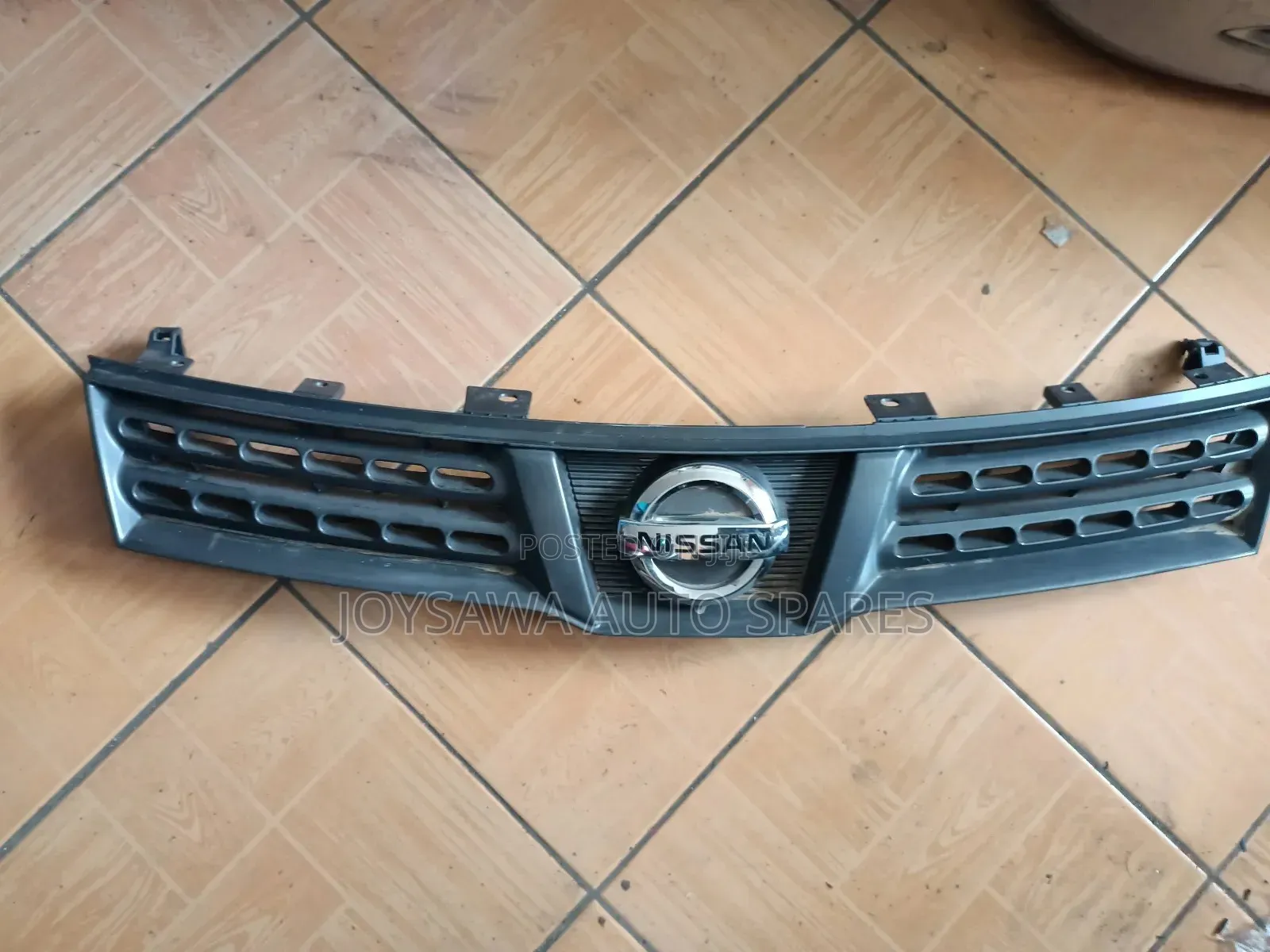 Nissan Wingrod Y12 Grill