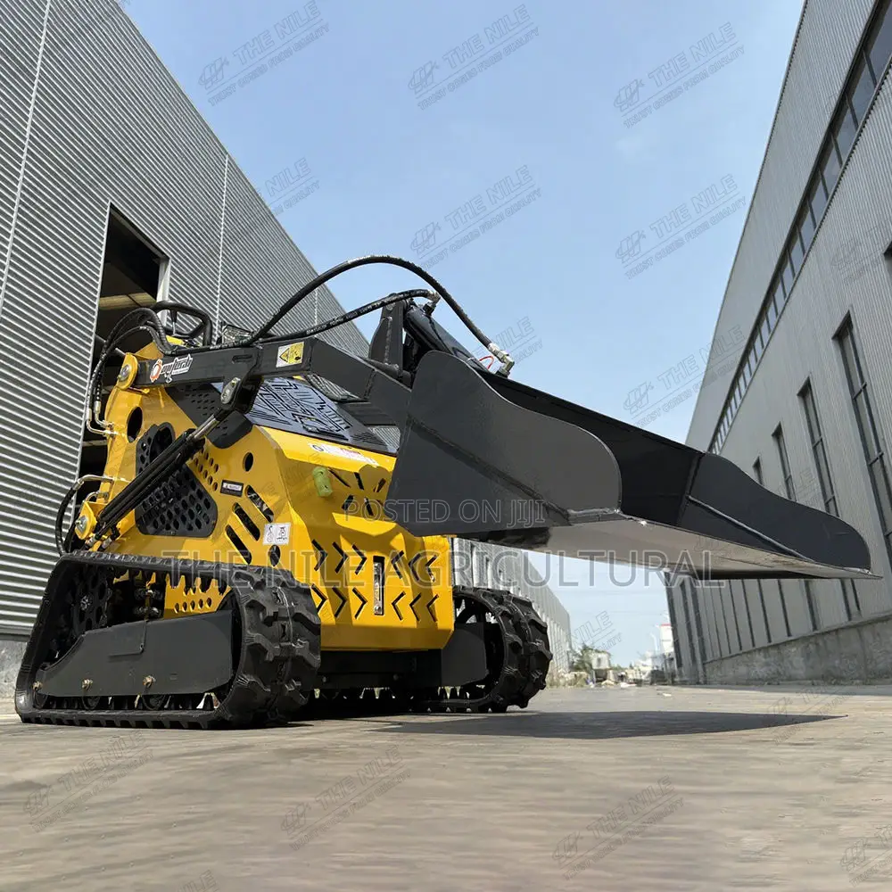Compact Multi-Purpose Loader, Equipped With Various Attachments