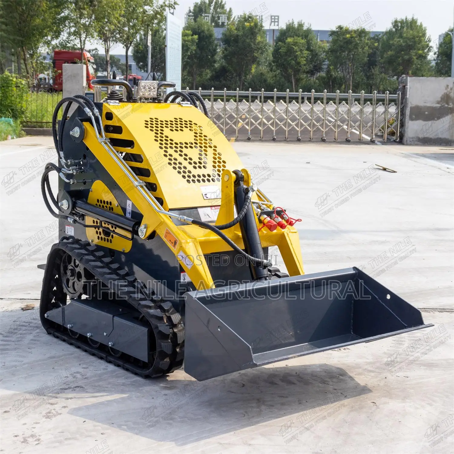 Compact Multi-Purpose Loader, Equipped With Various Attachments