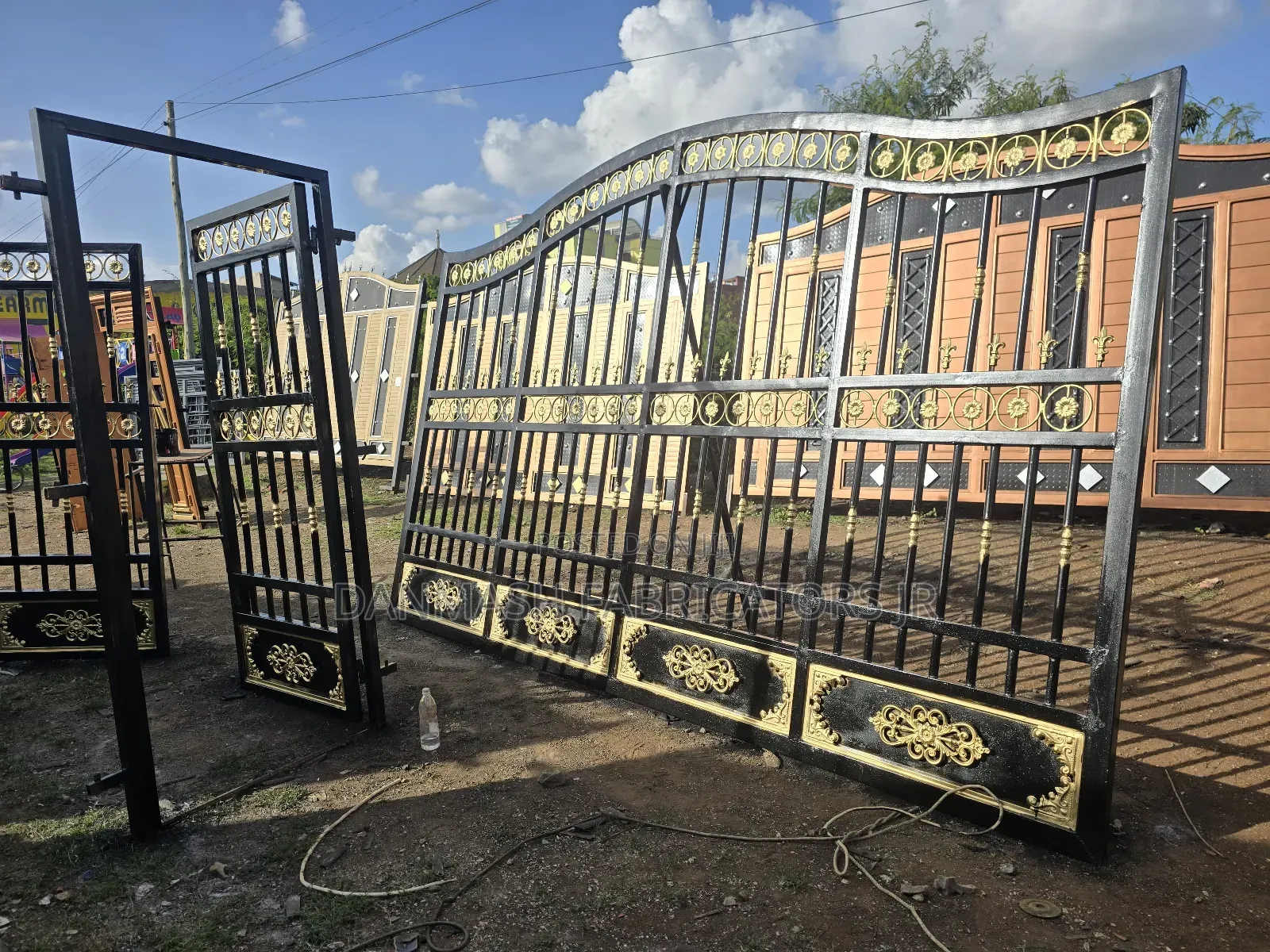 Stylish Black Gold Gate With Side Door