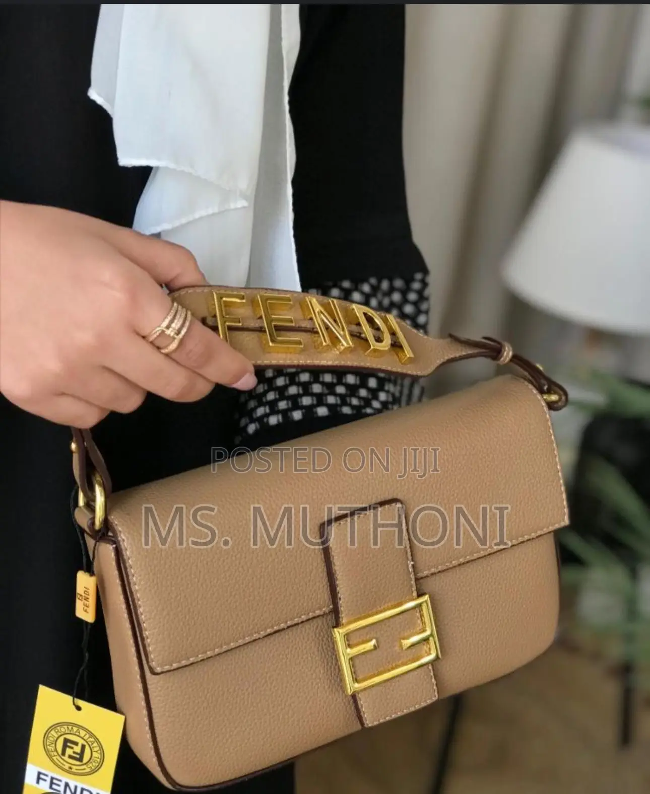 Fendi Medium Baguette Bag With Gold Hardware.