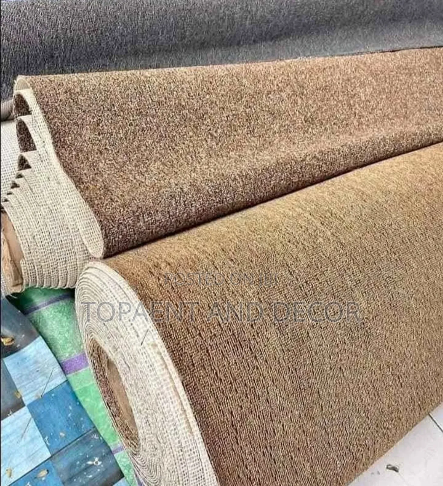 Rolls of Beige Wall to Wall Carpet