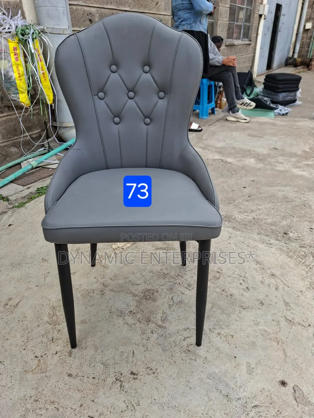 Gray Tufted Dining Chair With Black Legs