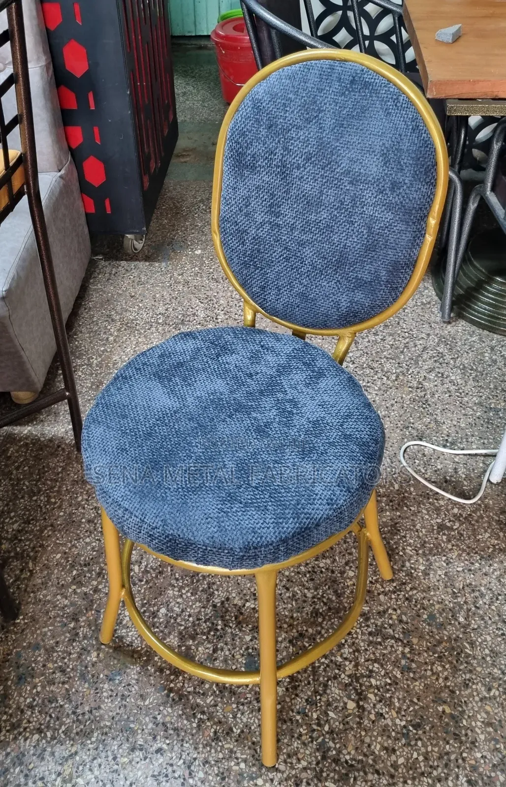 Blue Salon Chair With Gold Powder Coating Frame.