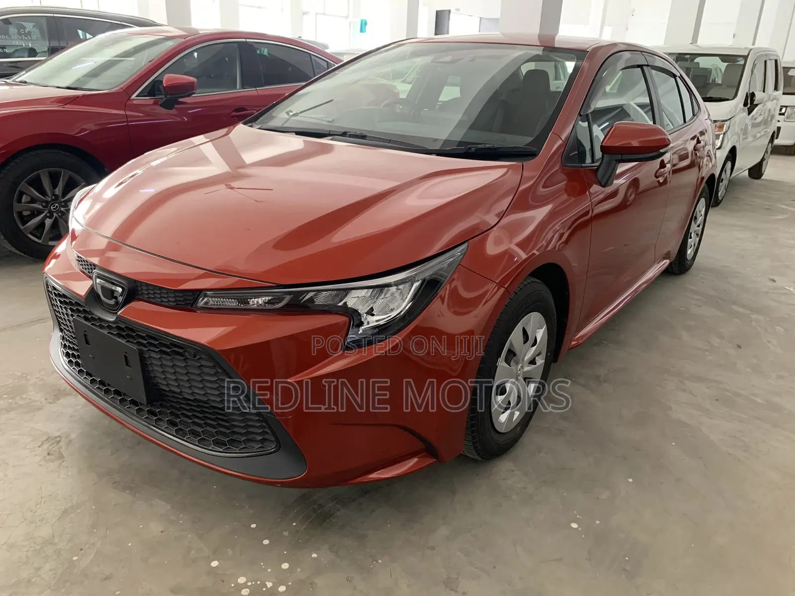 Toyota Corolla LE Eco (1.8L 4cyl 2A) 2019 Orange