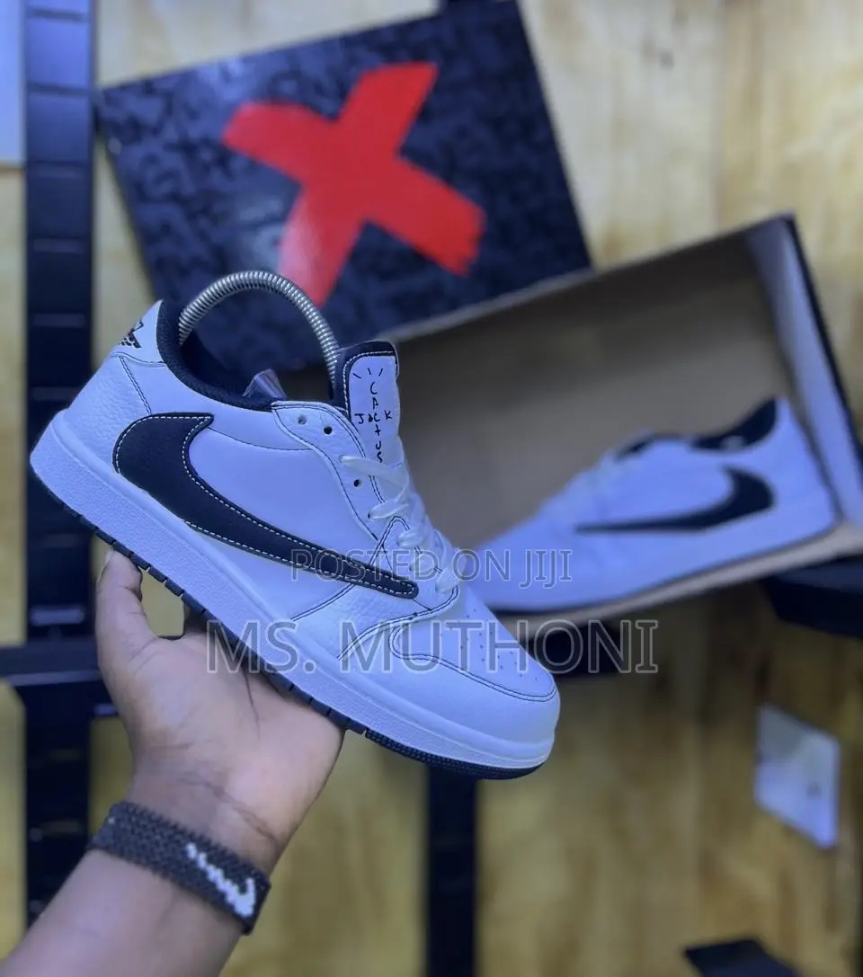 Nike Air Jordan 1 Low Travis Scott in the Dark Mocha Colorway.