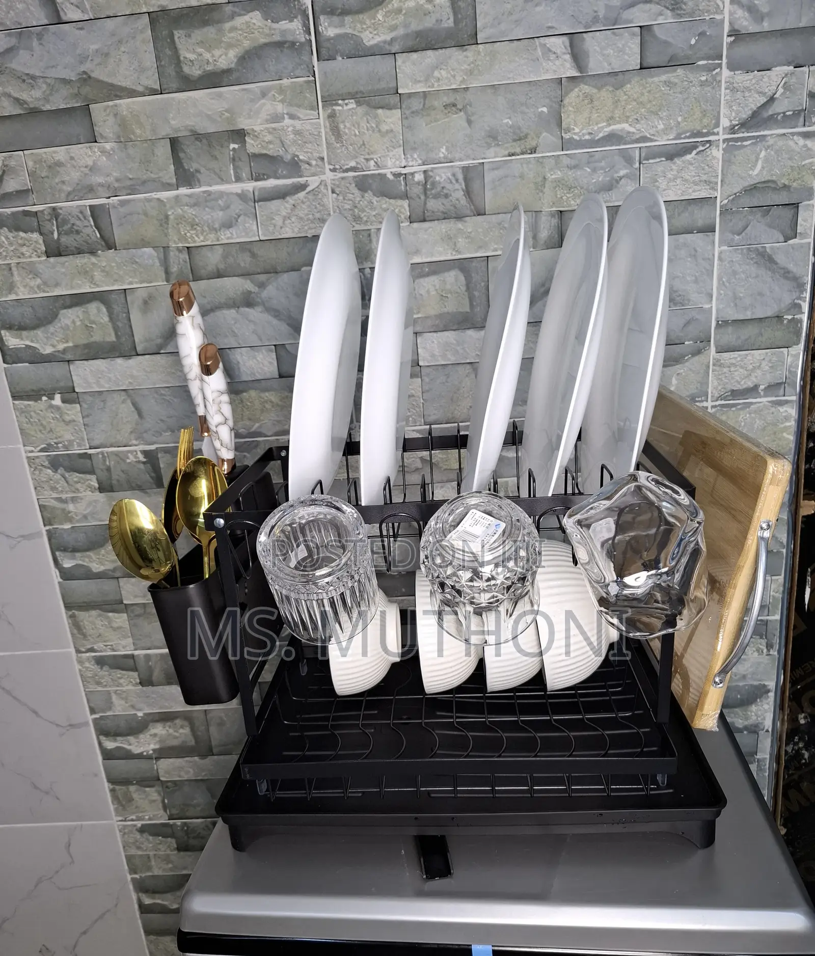 Dish Drying Rack With a Drainboard and Utensil Holder.