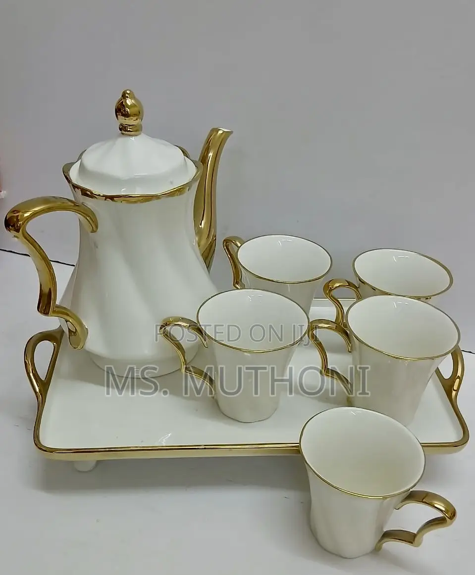 8 Piece White Ceramic Tea Set With Golden Rim