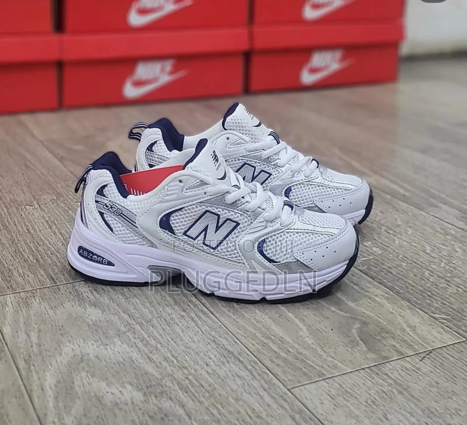 New Balance 530 Sneakers in a White