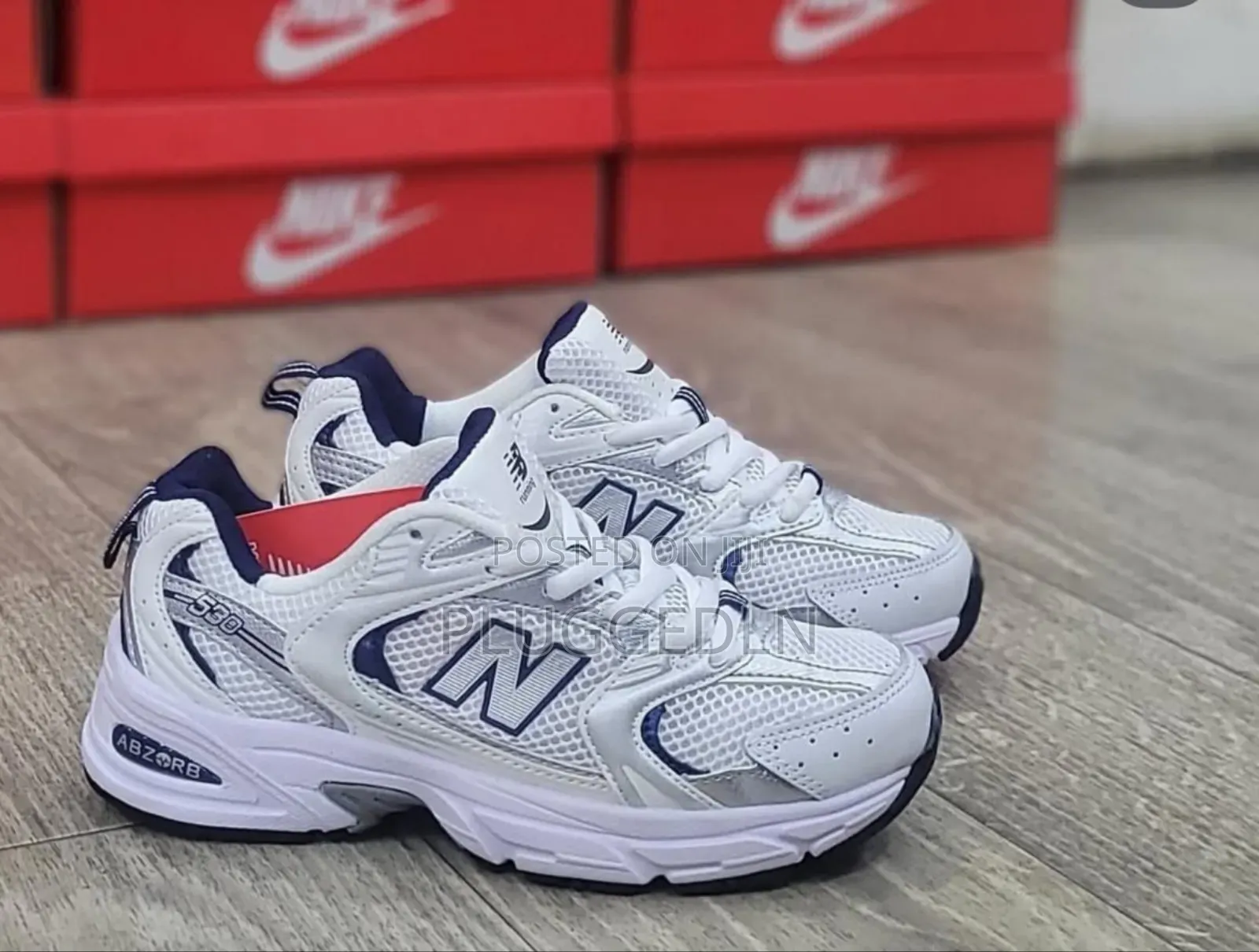 New Balance 530 Sneakers in a White