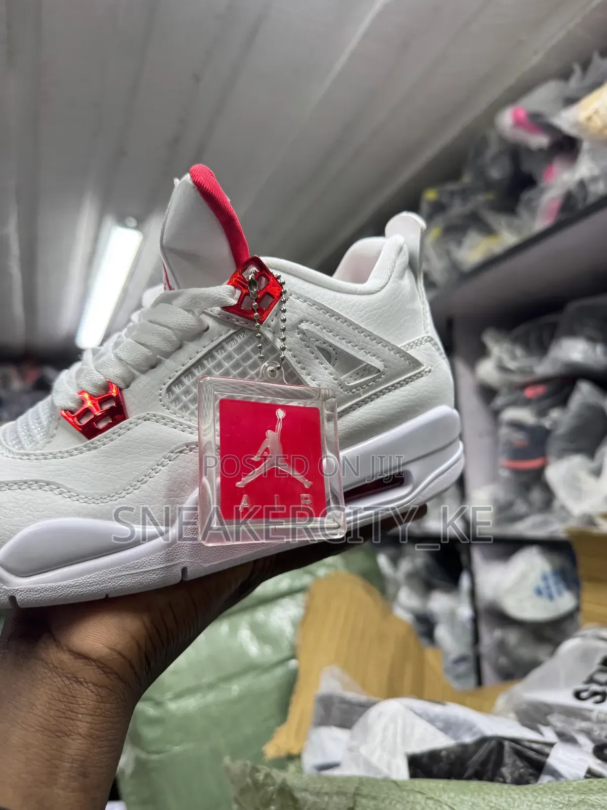 Jordan 4 Metallic Red