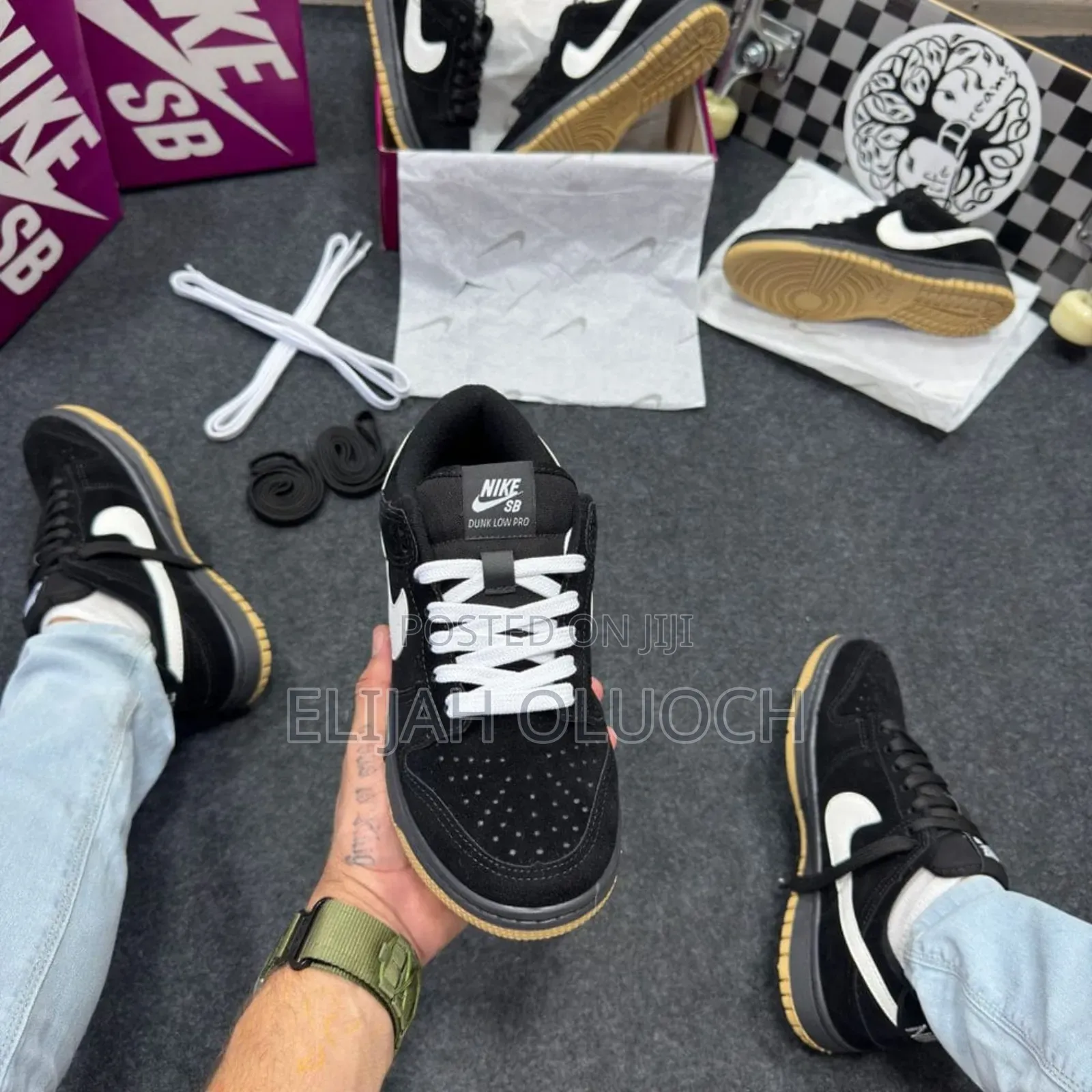 Nike Sb Dunk Low Pro in a Black, White, and Gum