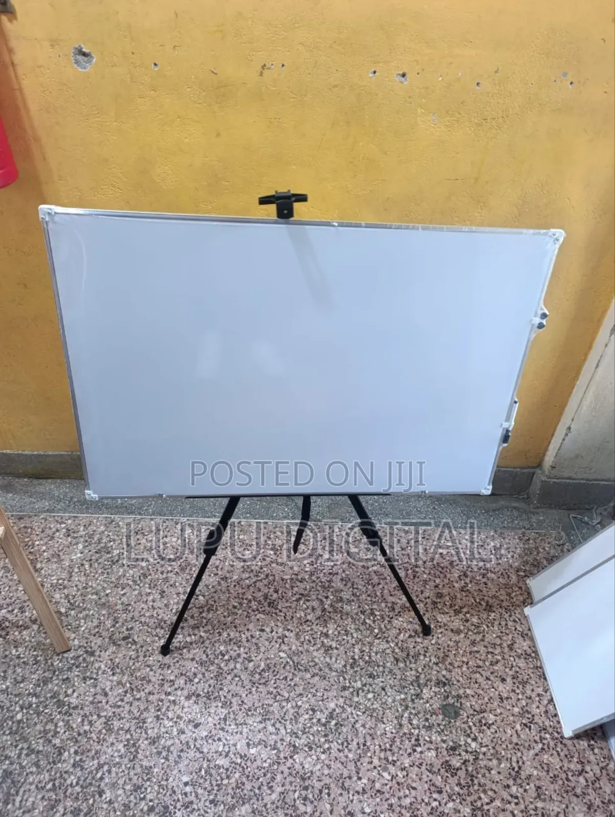 White Boards and Metalic Stand.