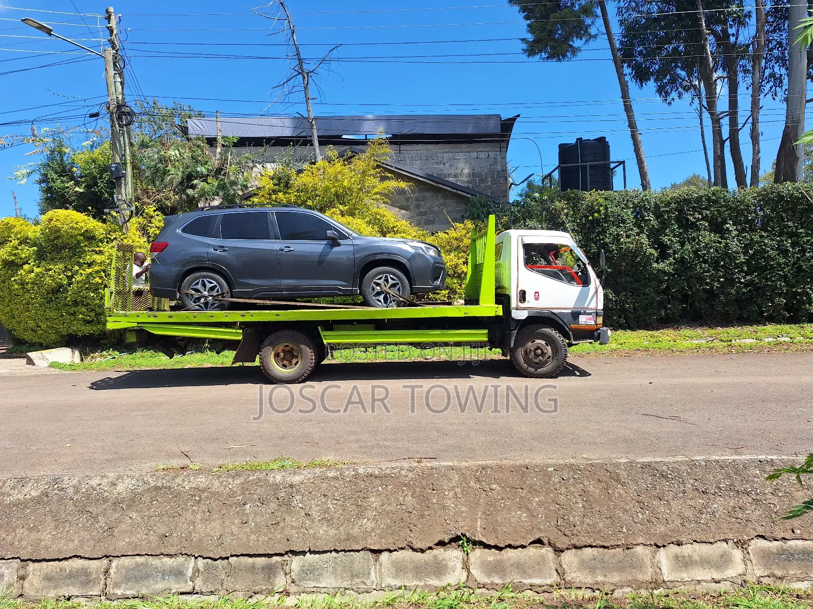 Karen Flatbed Towing- Sliding Bed