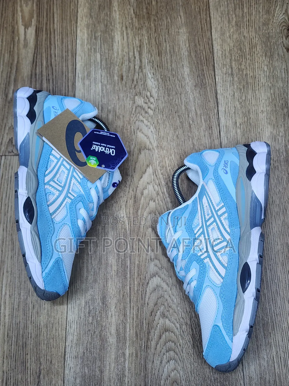 An Asics Gel-nyc Sneaker In A Light Blue And White
