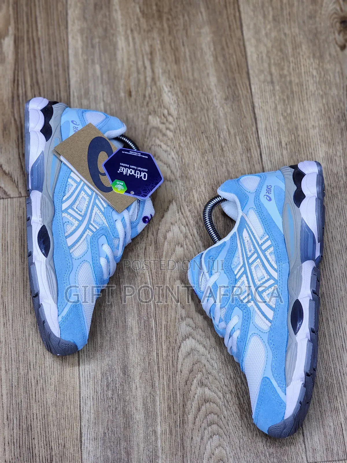 An Asics Gel-nyc Sneaker In A Light Blue And White