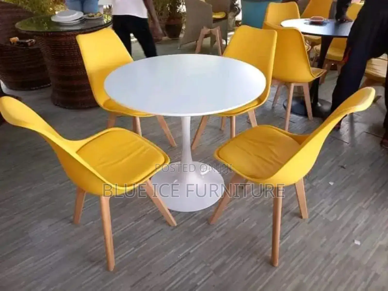 Round Dining Table and Padded Eames Chair